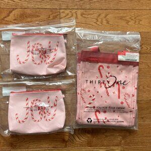 Thirty one lot 2 mini zipper pouches and 1 small essential storage tote